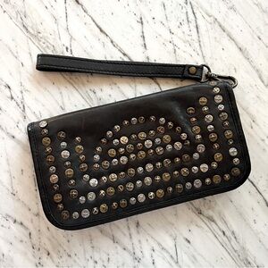 Clutch wallet with studded details